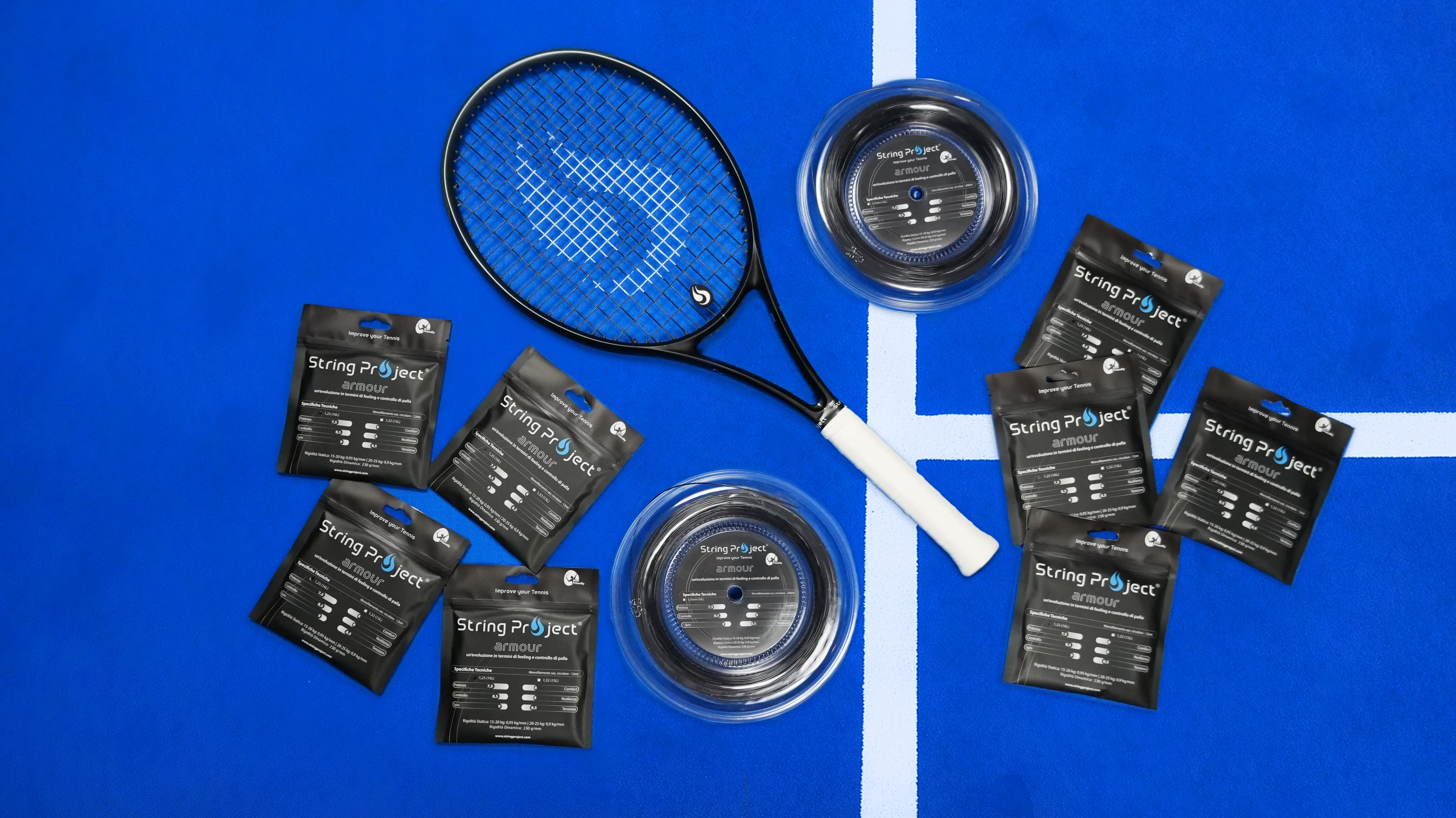 String Project Armour – black monofilament tennis strings with racket strung on blue court