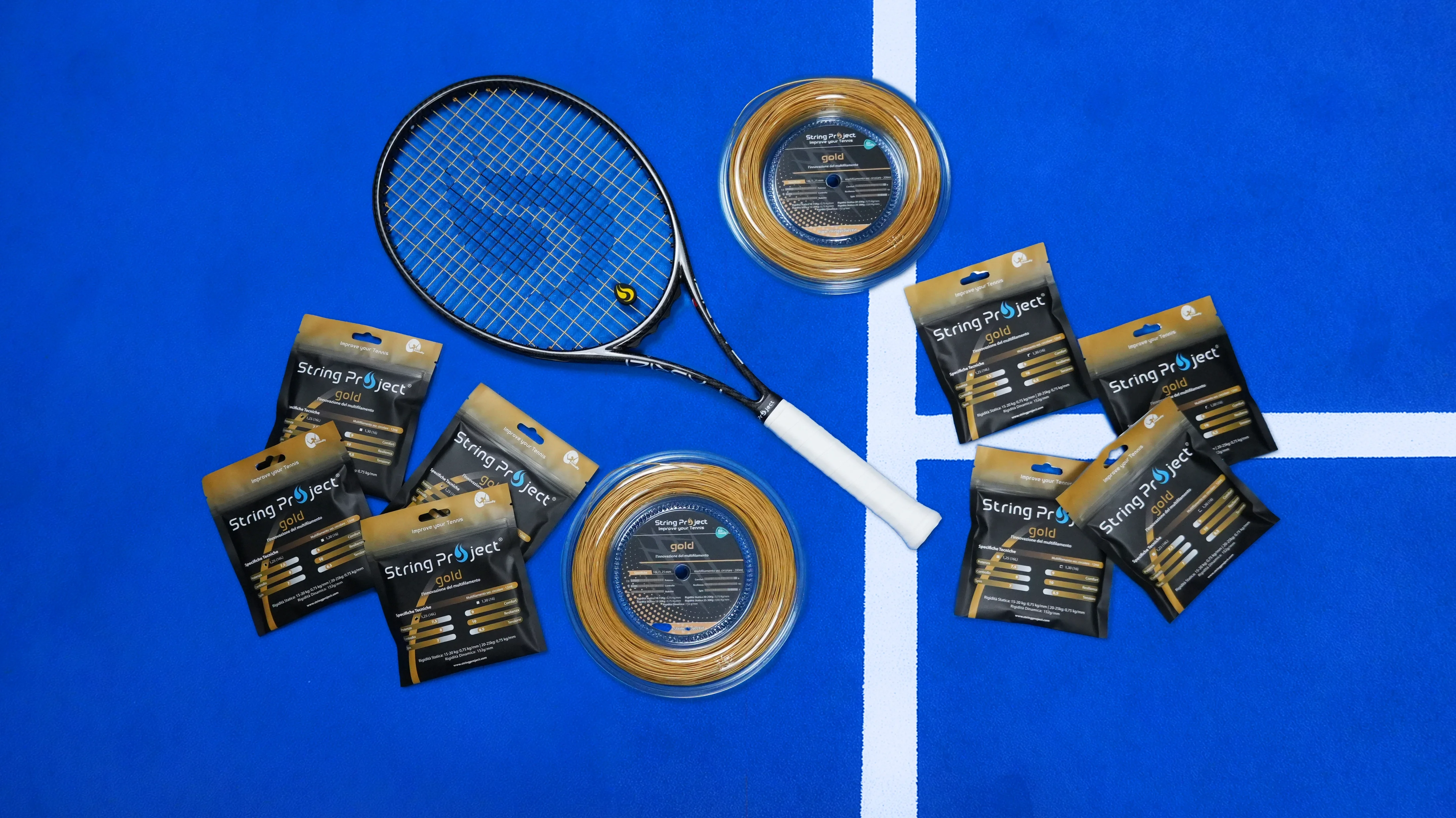 String Project Gold – gold multifilament tennis strings with racket strung on blue court