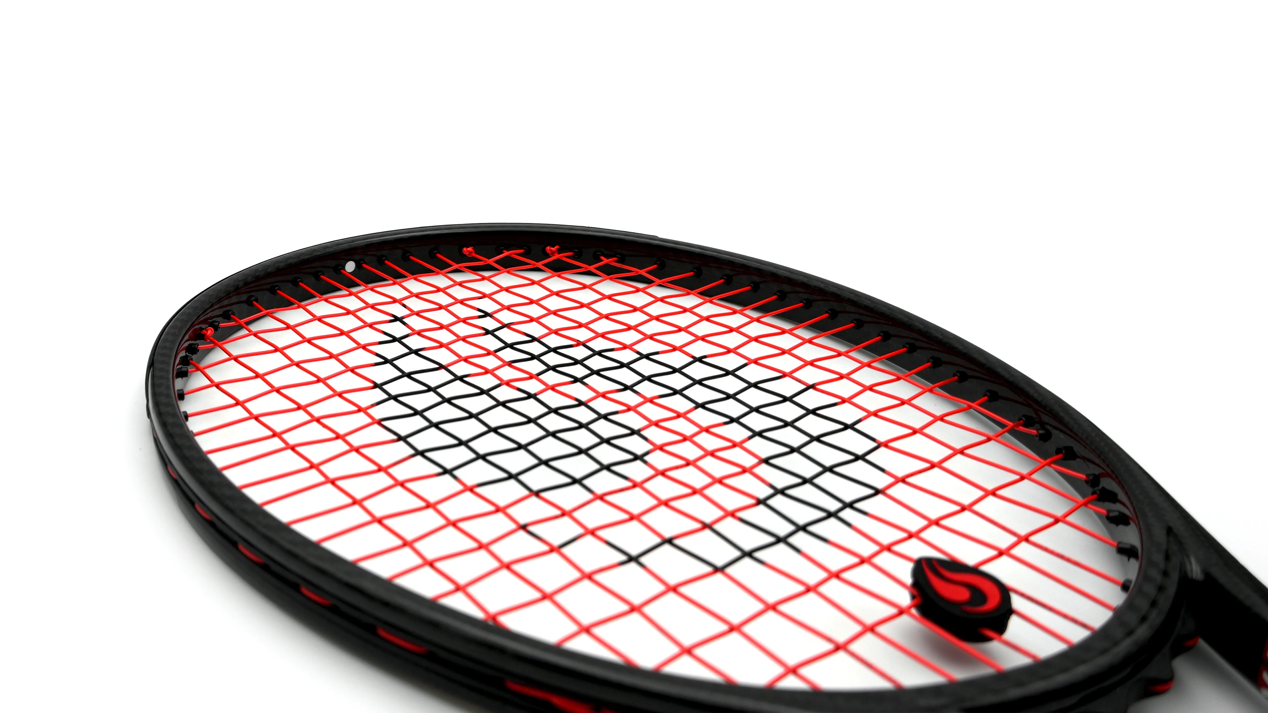 Detail of String Project Magic tennis strings strung on a racket